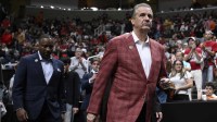 Arkansas Razorbacks head coach John Calipari returns to the court after halftime against the Arizona Wildcats during a Sweet Sixteen game of the West Regional of the men's 2026 NCAA Tournament at SAP Center.