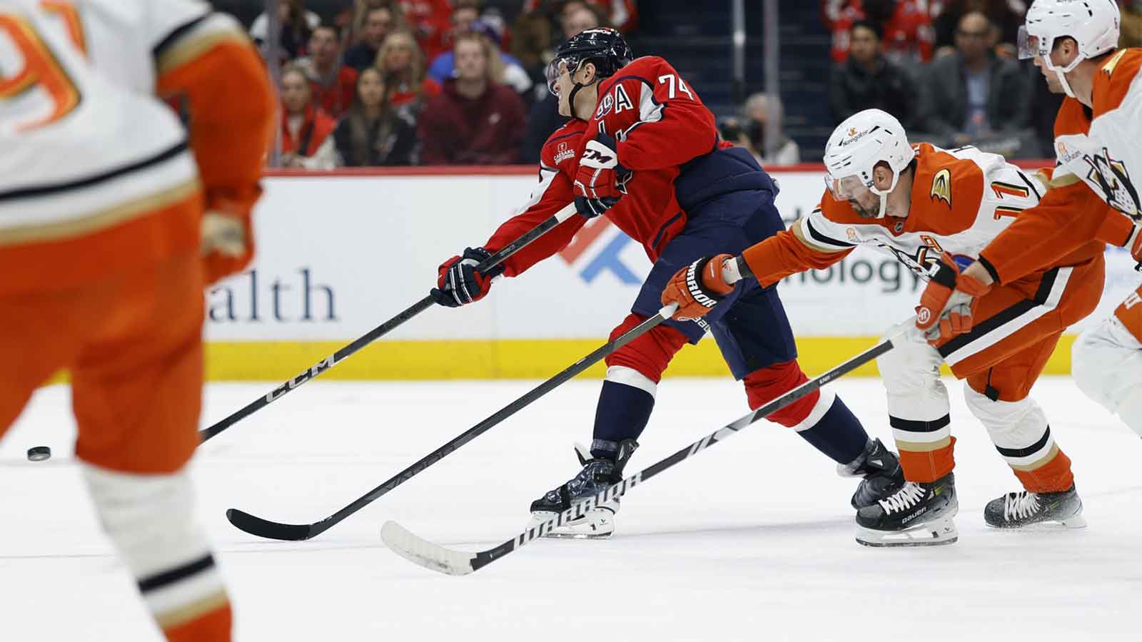 Washington Capitals defenseman John Carlson (74) scores a goal as Anaheim Ducks right wing Frank Vatrano (77) defends in the first period at Capital One Arena. 