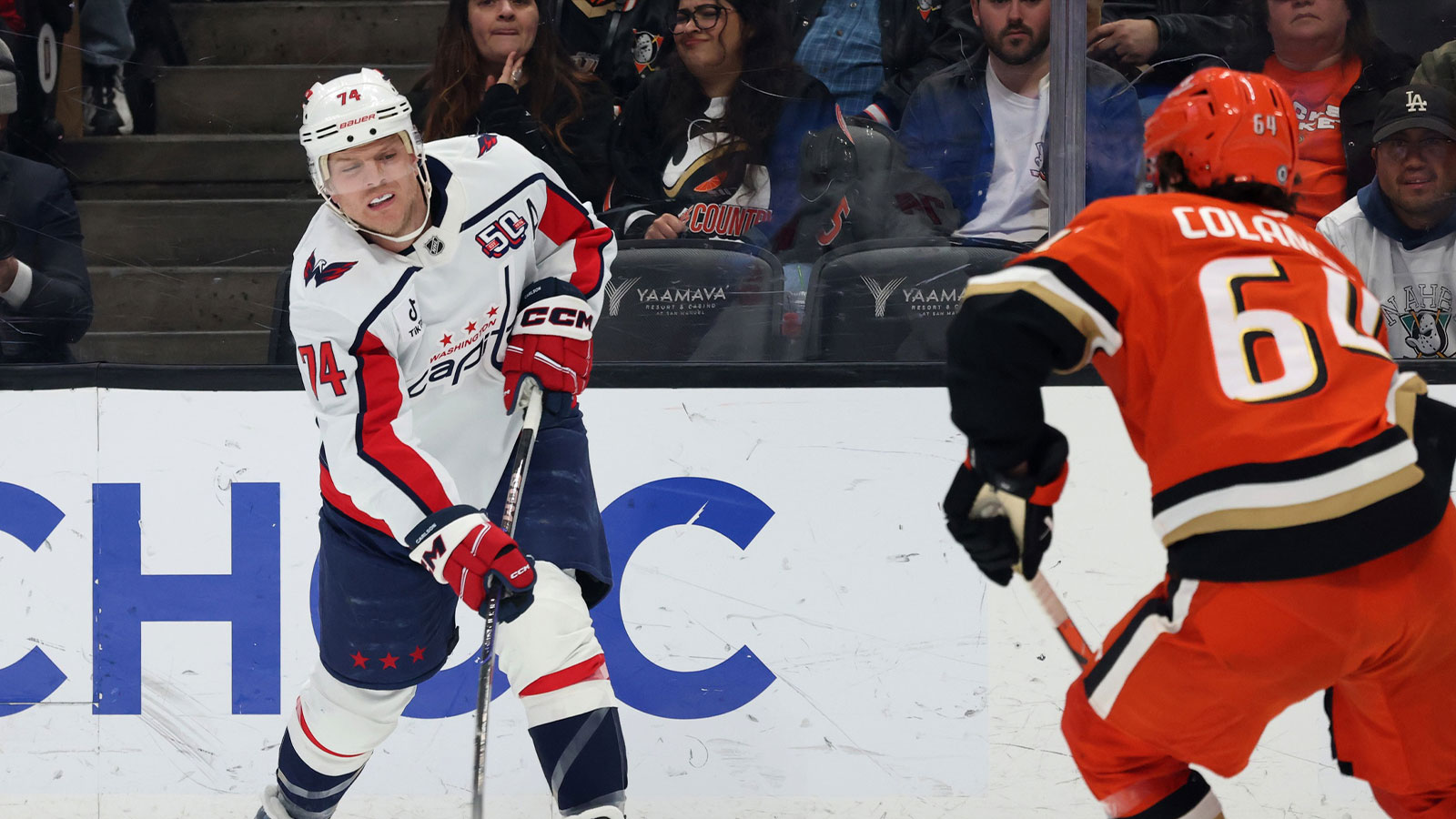 Washington Capitals defenseman John Carlson (74) shoots against Anaheim Ducks right wing Sam Colangelo (64) during the first period at Honda Center. 