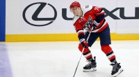 Washington Capitals defenseman John Carlson (74) passes the puck during the third period against the Carolina Hurricanes at Capital One Arena.