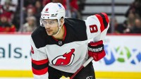 New Jersey Devils defenseman Johnathan Kovacevic (8) waits for a face-off against the Ottawa Senators during the first period at Canadian Tire Centre.