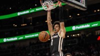 Atlanta Hawks forward Jalen Johnson (1) dunks against the Orlando Magic during the second half at State Farm Arena.