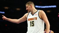 ; Denver Nuggets center Nikola Jokic (15) reacts against the Phoenix Suns in the second half at Mortgage Matchup Center.