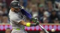 New York Yankees shortstop Jose Caballero (72) hits a double against the Minnesota Twins in the fourth inning at Target Field.