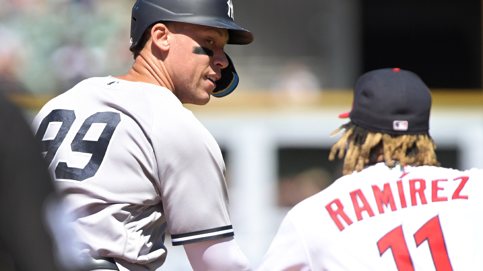 New York Yankees designated hitter Aaron Judge (99) is tagged out by Cleveland Guardians third baseman Jose Ramirez (11) during the eighth inning at Progressive Field. 