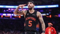 New York Knicks guard Jose Alvarado (5) gestures after scoring in the third quarter against the Indiana Pacers at Madison Square Garden.