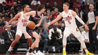 Mar 19, 2026; Chicago, Illinois, USA; Cleveland Cavaliers guard Sam Merrill (5) defends Chicago Bulls guard Josh Giddey (3) during the first quarter at United Center. Mandatory Credit: David Banks-Imagn Images