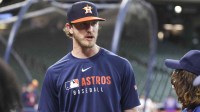 Houston Astros relief pitcher Josh Hader talks with fans before the game against the Colorado Rockies at Daikin Park.