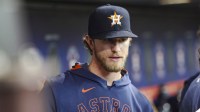 Houston Astros relief pitcher Josh Hader walks in the dugout before the game against the New York Yankees at Daikin Park.