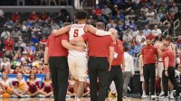 Iowa State Cyclones forward Joshua Jefferson (5) is helped off of the court after suffering an apparent injury to his left leg against Tennessee State Tigers during the first half of a first round game of the men's 2026 NCAA Tournament at Enterprise Center.