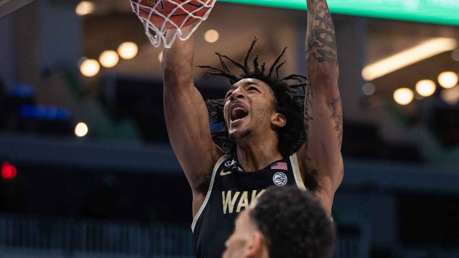 Wake Forest Demon Deacons forward Juke Harris (2) dunks the ball against the Virginia Tech Hokies during the first half of the 2025 ACC Men's Baskeetball Championship at Spectrum Center in Charlotte, NC.