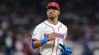Dominican Republic center fielder Julio Rodriguez (44) returns to the dugout against the Netherlands during the sixth inning at loanDepot Park.