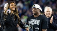 NBC Sports host Maria Taylor interviews Seattle Seahawks running back Kenneth Walker III (9) as he celebrates with the Vince Lombardi trophy after defeating the New England Patriots in Super Bowl LX at Levi's Stadium.