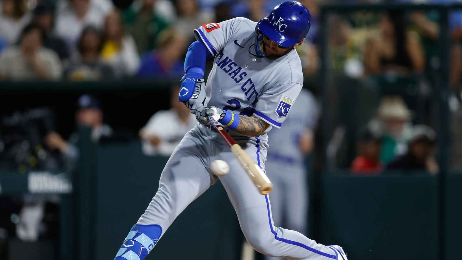 Kansas City Royals catcher Carter Jensen (22) hits a single during the fourth inning against the Athletics at Sutter Health Park.