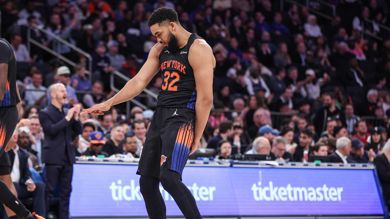 New York Knicks center Karl-Anthony Towns (32) gestures after scoring in the third quarter against the New Orleans Pelicans at Madison Square Garden. 