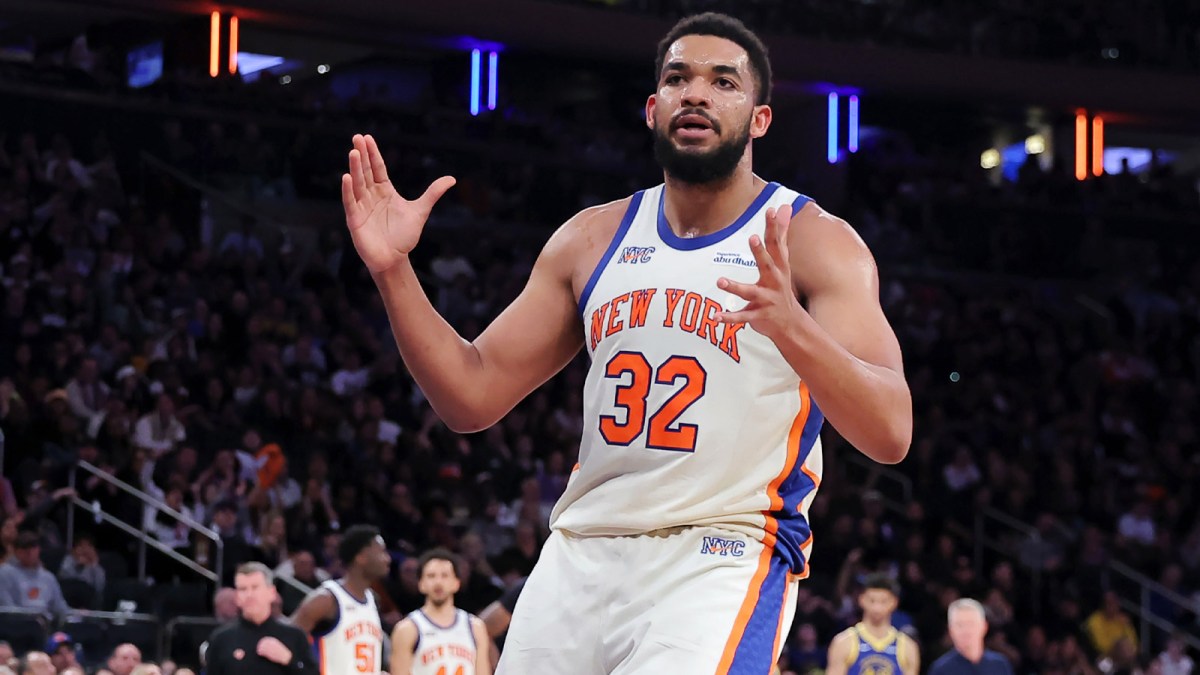 New York Knicks center Karl-Anthony Towns (32) reacts during the third quarter against the Golden State Warriors at Madison Square Garden.