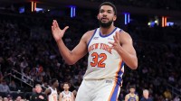 New York Knicks center Karl-Anthony Towns (32) reacts during the third quarter against the Golden State Warriors at Madison Square Garden.