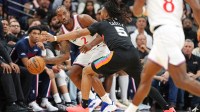 Los Angeles Clippers forward Kawhi Leonard (2) passes the ball while defended by San Antonio Spurs guard Stephon Castle (5) during the second half at Frost Bank Center.