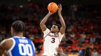 Auburn Tigers forward KeShawn Murphy (3) makes a three-pointer late in the game as Auburn Tigers take on Kentucky Wildcats at Neville Arena in Auburn, Ala. on Saturday, Feb. 21, 2026. Auburn Tigers defeated Kentucky Wildcats 75-74.