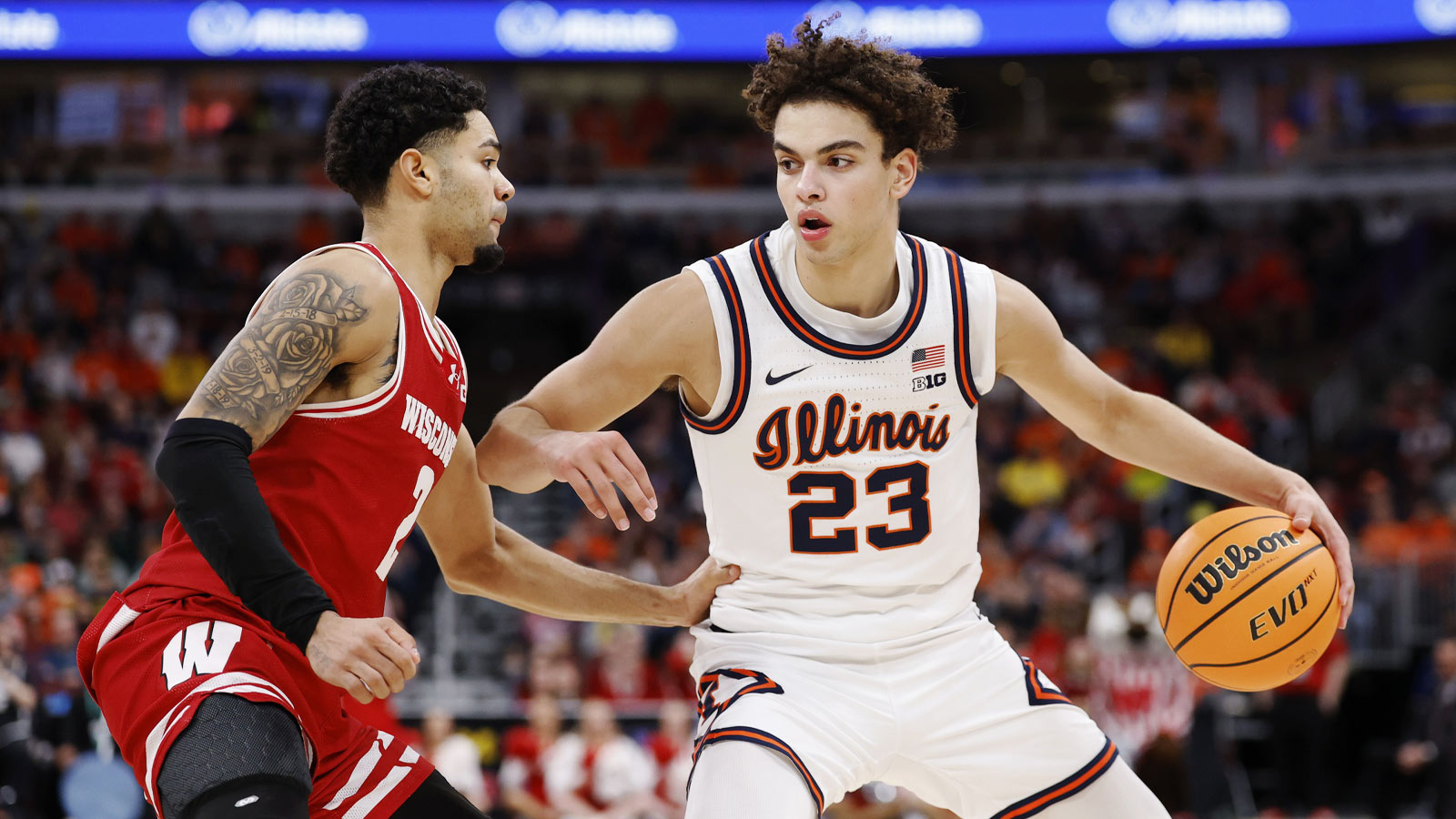 Wisconsin Badgers guard Nick Boyd (2) defends against Illinois Fighting Illini guard Keaton Wagler (23) during the second half at United Center. 