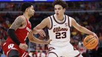 Wisconsin Badgers guard Nick Boyd (2) defends against Illinois Fighting Illini guard Keaton Wagler (23) during the second half at United Center.