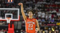 Illinois Fighting Illini guard Keaton Wagler (23) reacts after shooting a three point basket during the first half against the Maryland Terrapins at Xfinity Center.