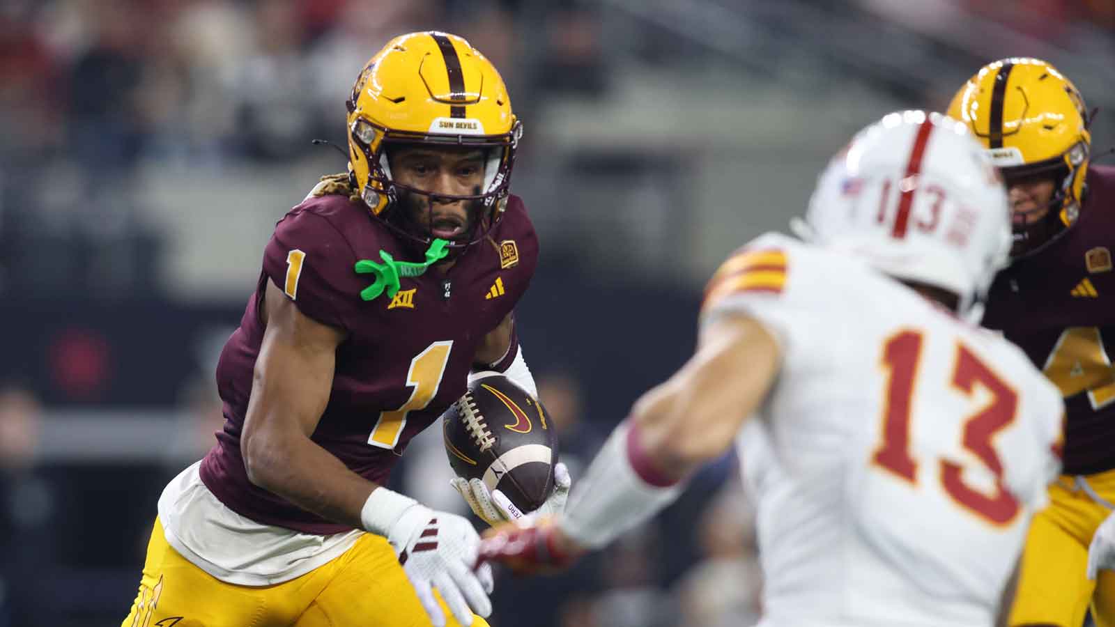 Arizona State Sun Devils defensive back Keith Abney II (1) runs with the ball after intercepting a pass against the Iowa State Cyclones in the third quarter at AT&T Stadium. 