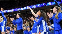 The Kentucky Wildcats bench celebrates Friday, March 6, 2026, during the SEC Women's Basketball Tournament quarterfinals game against the South Carolina Gamecocks at Bon Secours Wellness Arena in Greenville, South Carolina.