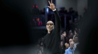 Former Bearcat and NBA player Kenyon Martin acknowledges the crowd during a stop in play in the game between the Xavier Musketeers and the Cincinnati Bearcats in the first half at Fifth Third Arena.