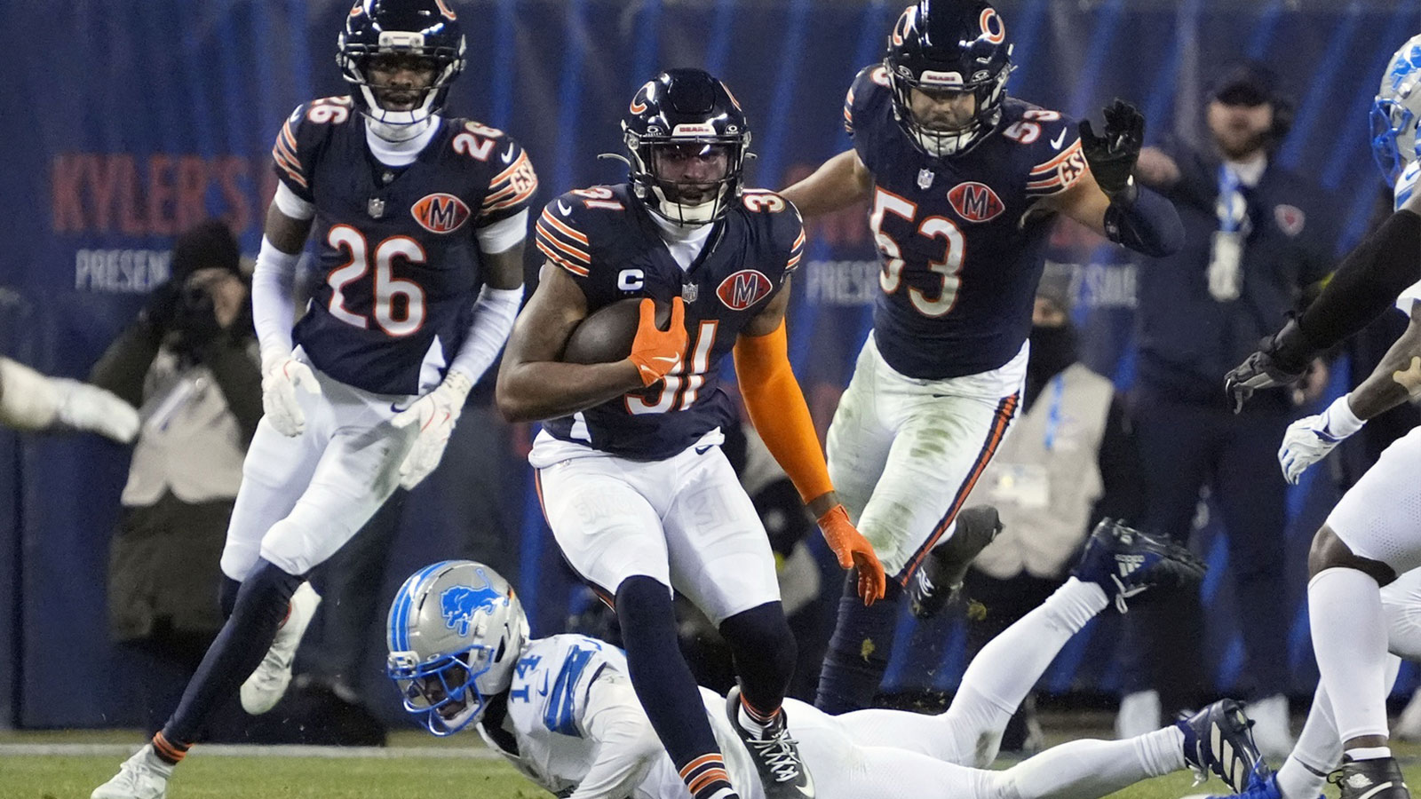 Chicago Bears safety Kevin Byard III (31) runs with the ball after making an interception against the Detroit Lions during the second half at Soldier Field. 