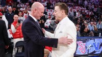 Villanova Wildcats head coach Kevin Willard greets St. John's Red Storm head coach Rick Pitino at Madison Square Garden.