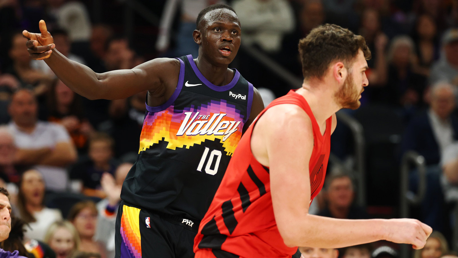 Phoenix Suns center Khaman Maluach (10) celebrates a three point shot against the Portland Trail Blazers in the first half at Mortgage Matchup Center. 