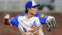 Atlanta Braves shortstop Ha-Seong Kim (9) throws the ball to first base for an out against the Pittsburgh Pirates during the seventh inning at Truist Park