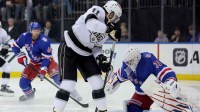 New York Rangers goaltender Igor Shesterkin (31) makes a save against Los Angeles Kings center Anze Kopitar (11) during the first period at Madison Square Garden.