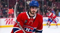Montreal Canadiens center Kirby Dach (77) looks on during warm-up before the game against the Dallas Stars at Bell Centre.