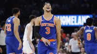 Knicks guard Josh Hart (3) reacts after a foul is called against him during the second half against the Oklahoma City Thunder at Paycom Center with ESPN's Stephen A Smith in the background