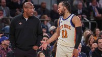 Knicks head coach Mike Brown talks wth guard Jalen Brunson (11) in the fourth quarter against the Orlando Magic at Madison Square Garden with Chandler Parsons in the background with Thunder's Shai Gilgeous-Alexander in the background