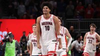 Arizona Wildcats forward Koa Peat (10) reacts after defeating the Houston Cougars during the men's Big 12 Conference Tournament Championship at T-Mobile Center.