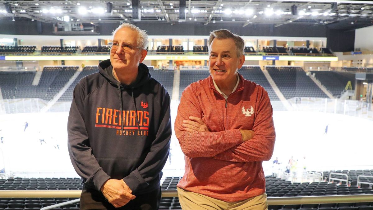 Tim Leiweke, left, and Tod Leiweke speaks to the press during the Coachella Valley Firebirds first practice on the main rink at Acrisure Arena in Thousand Palms, Calif., Dec. 12, 2022. Firebirds Practice 12