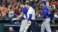 United States; Italy catcher Kyle Teel (3) leaves the game after he injured himself after sliding into second base against the United States in the sixth inning at Daikin Park.