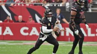 Arizona Cardinals quarterback Kyler Murray (1) looks to throw against the Tennessee Titans during the second quarter at State Farm Stadium.