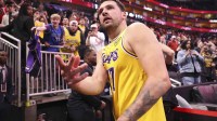 Los Angeles Lakers guard Luka Doncic (77) throws a wrist band into the crowd after the game against the Houston Rockets at Toyota Center. Mandatory Credit: Troy Taormina-Imagn Images