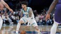 Charlotte Hornets guard LaMelo Ball (1) handles the ball against the Sacramento Kings during the second half at Spectrum Center.