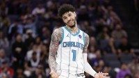 Charlotte Hornets guard LaMelo Ball (1) smiles and gestures after scoring a three point basket against the Sacramento King during the fourth quarter at Golden 1 Center.