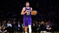 Los Angeles Lakers guard Luka Doncic (77) controls the ball during the second half against the Brooklyn Nets at Crypto.com Arena.