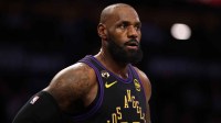 Lakers forward LeBron James (23) wears a patch