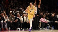 Los Angeles Lakers guard Luka Doncic (77) reacts against the Miami Heat during the second half at Kaseya Center.