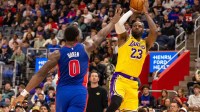 Los Angeles Lakers LeBron James (23) shoots a jump shot over Detroit Pistons Jalen Duren (0) during the first quarter at Little Caesars Arena.