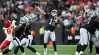 Las Vegas Raiders quarterback Aidan O'Connell (12) throws the ball against the Kansas City Chiefs in the second half at Allegiant Stadium.