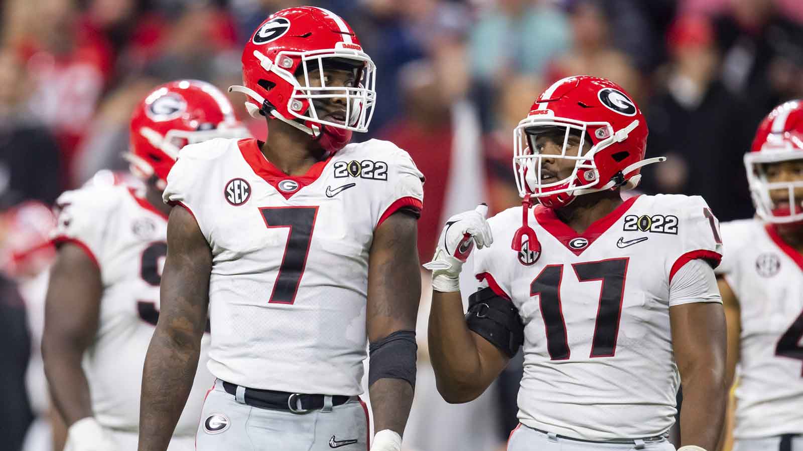 Georgia Bulldogs linebacker Quay Walker (7) and Nakobe Dean (17) against the Alabama Crimson Tide in the 2022 CFP college football national championship game at Lucas Oil Stadium. 